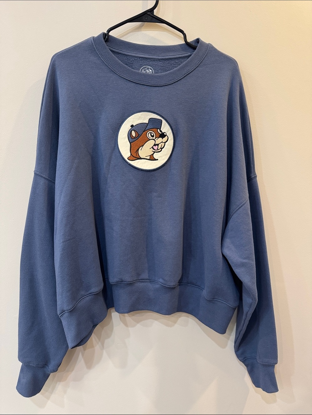 Oversized Slate Blue Crewneck Sweatshirt with Embroidered Character Patch